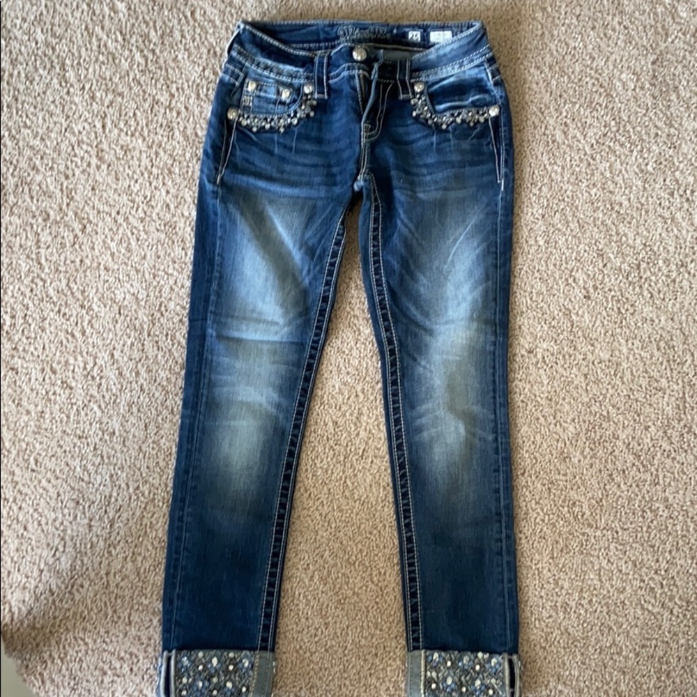 Miss me capris with jeweled cuffs.
